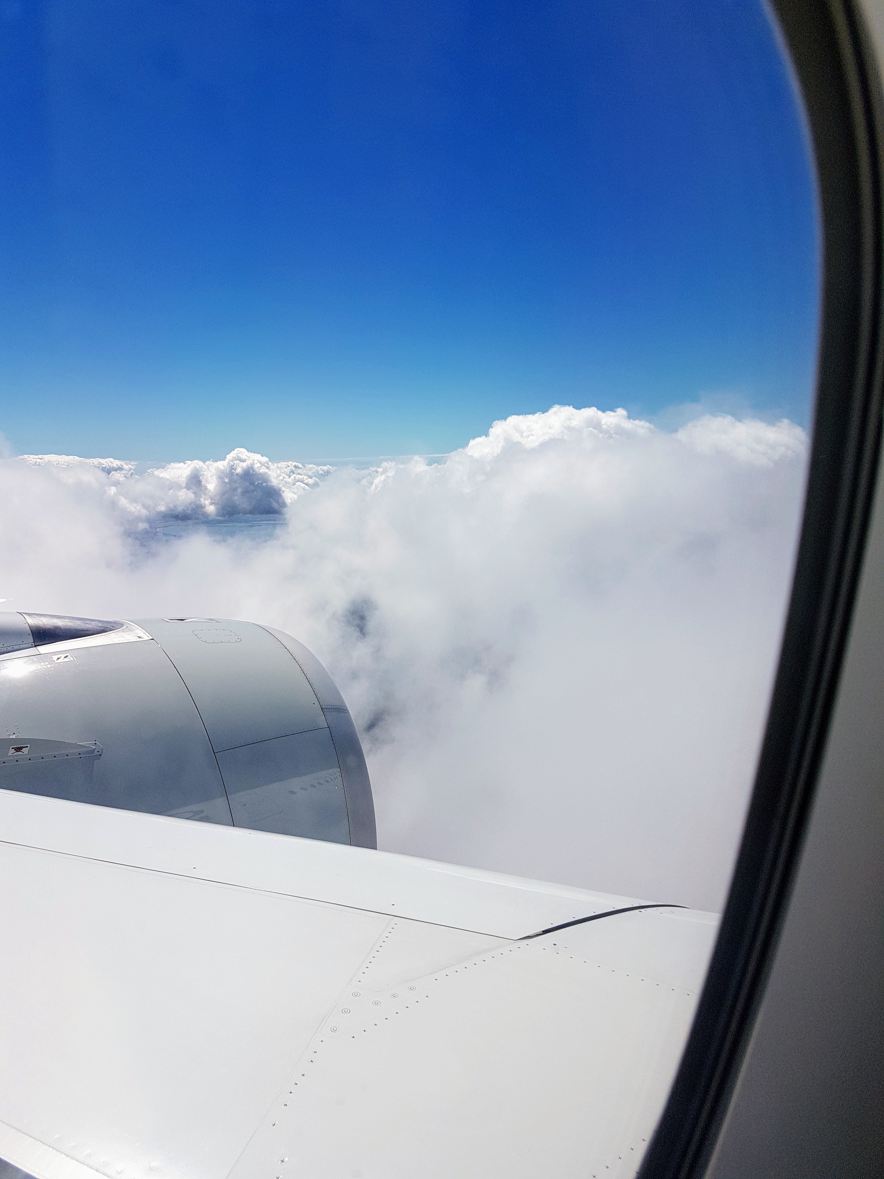 Photo by Daniel Frese: https://www.pexels.com/photo/airliner-window-showing-clouds-1547726/